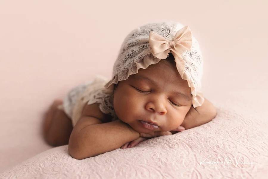 newborn baby girl with brown hair